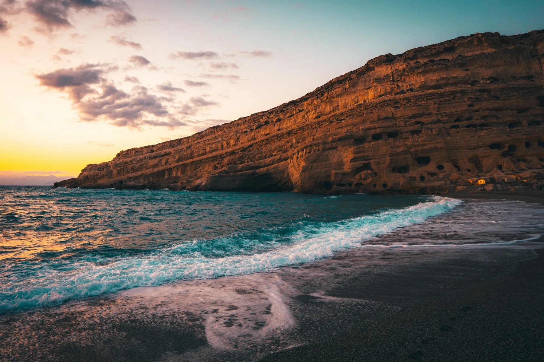 The cave-riddled cliffs of Matala